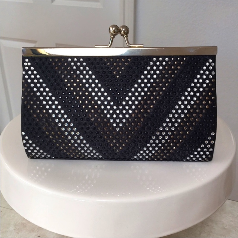 Black satin evening purse with rhinestone detail.